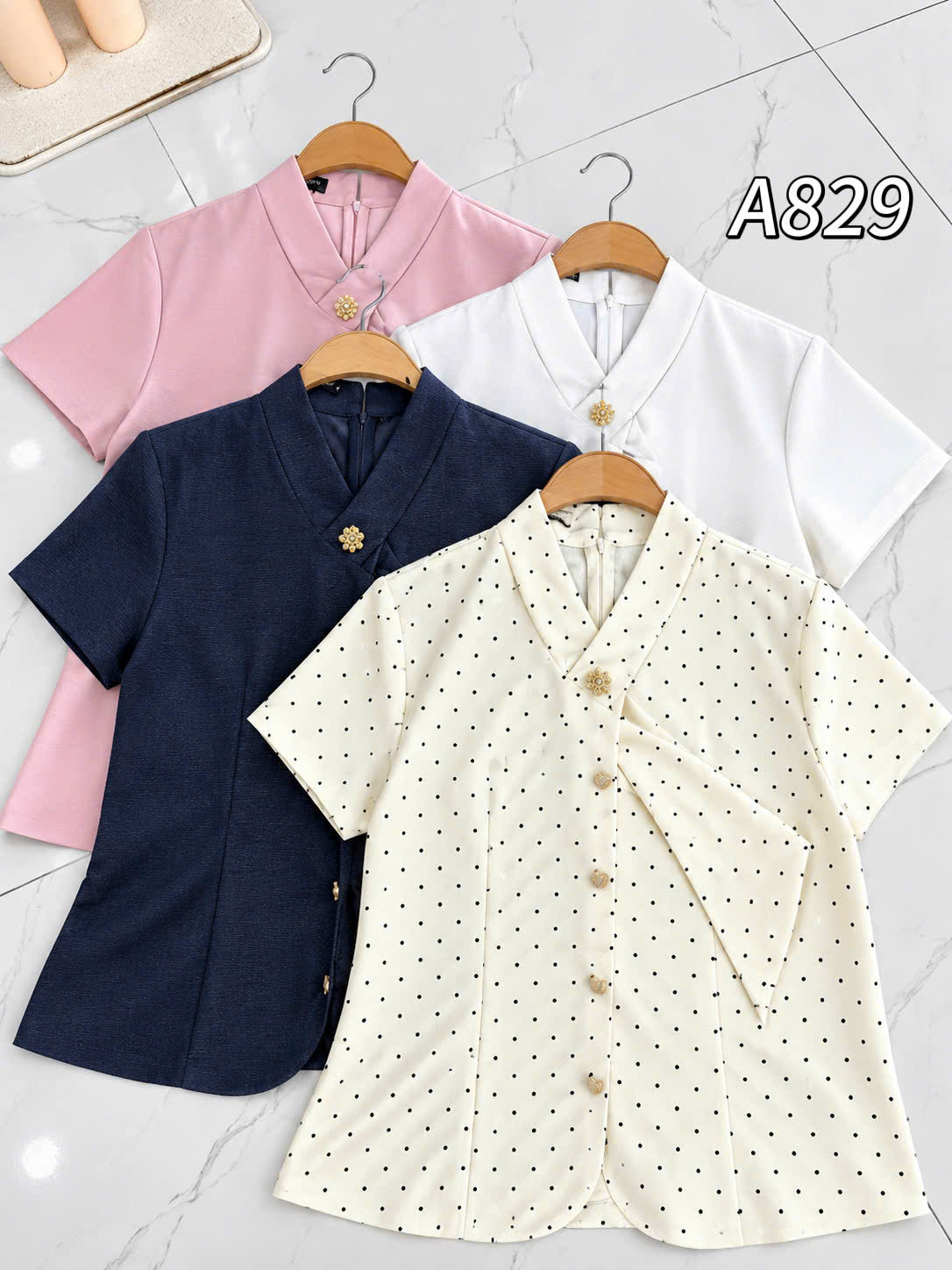 A829 áo cổ V khuy đá