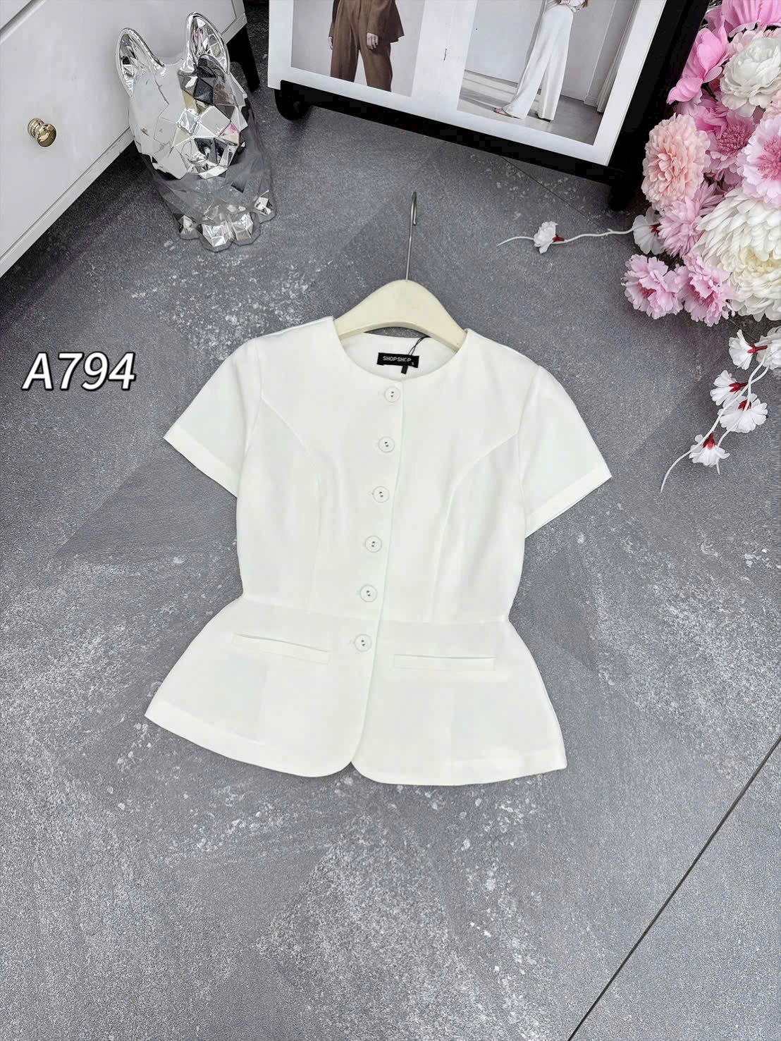 A794 áo peplum cúc bọc