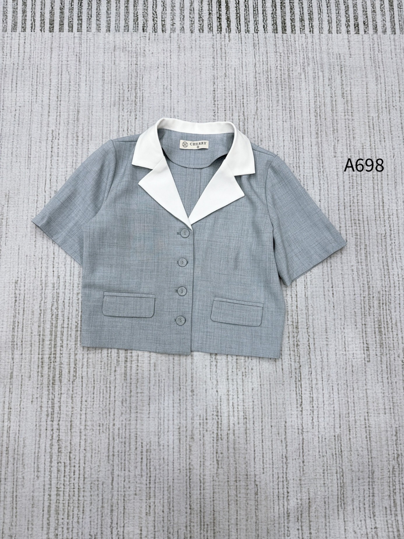 A698 áo cổ vest cúc bọc