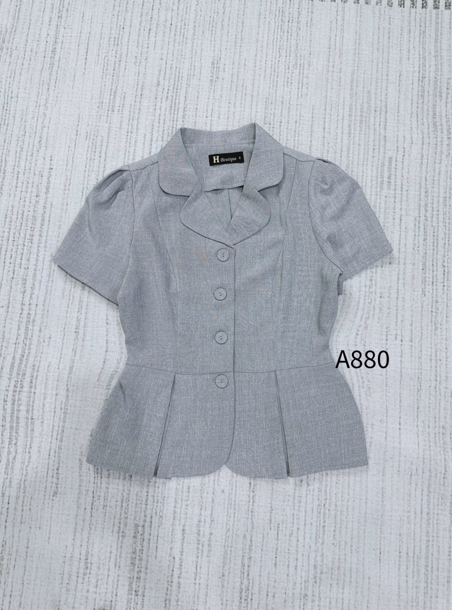 A880 Áo peplum cổ B cúc bọc