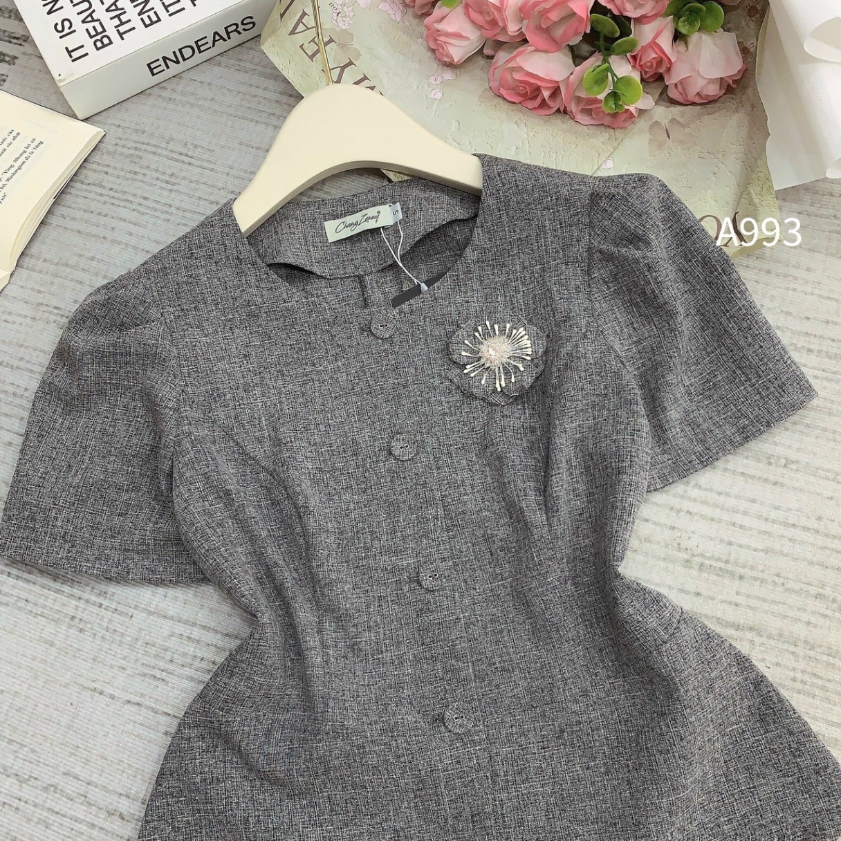 A993 Áo peplum tag hoa đá