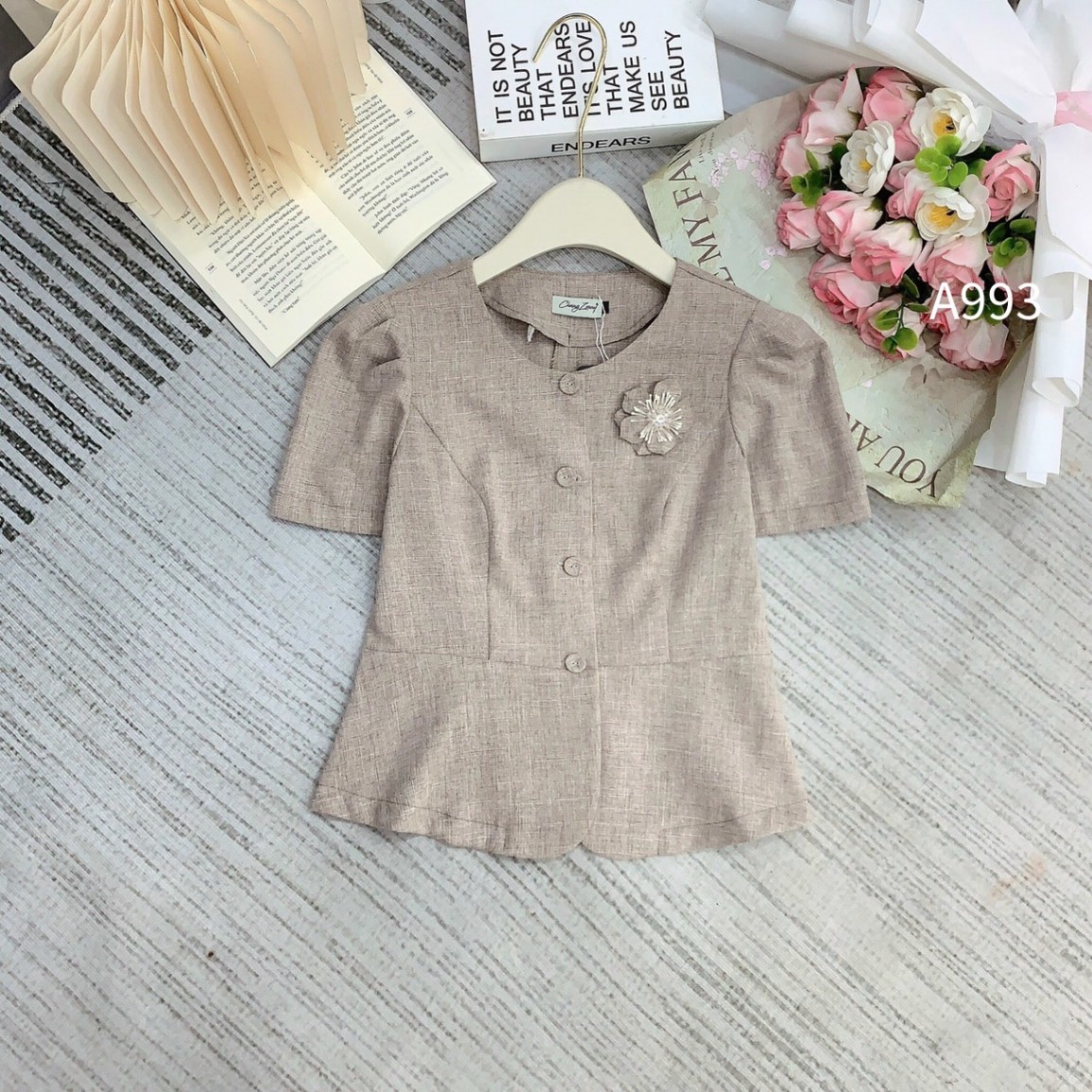 A993 Áo peplum tag hoa đá