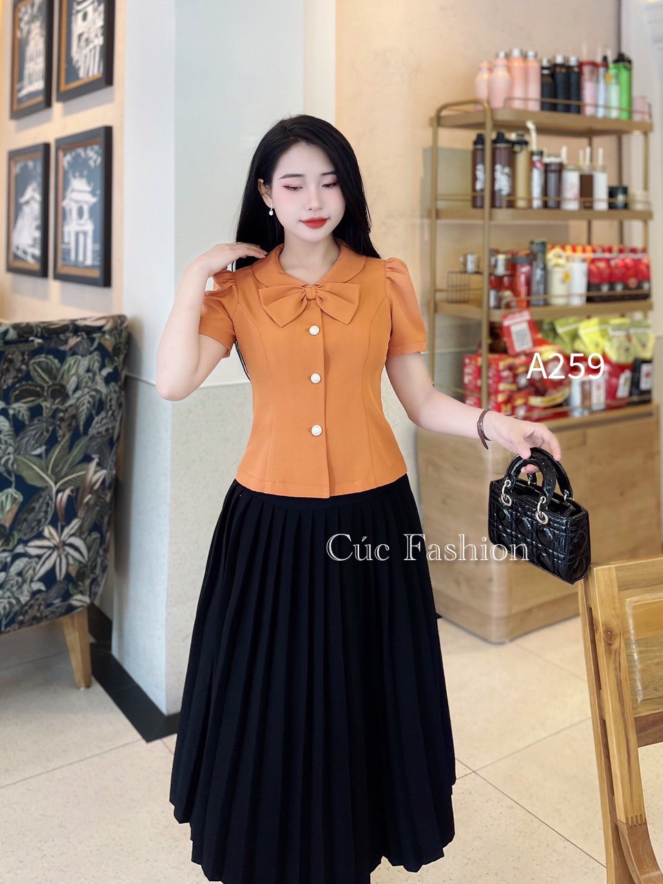 A259 áo peplum cổ nơ 3 cúc