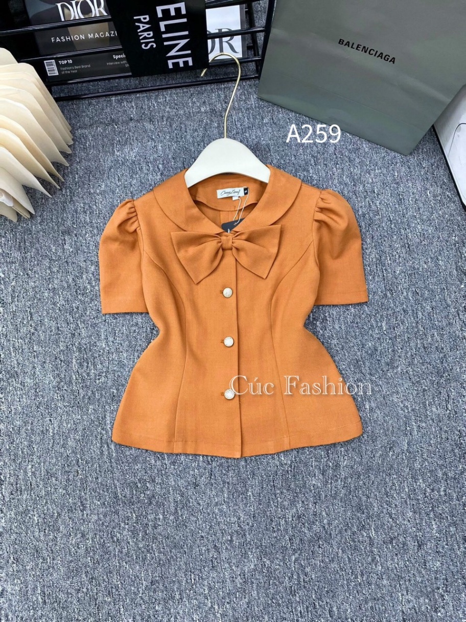 A259 áo peplum cổ nơ 3 cúc