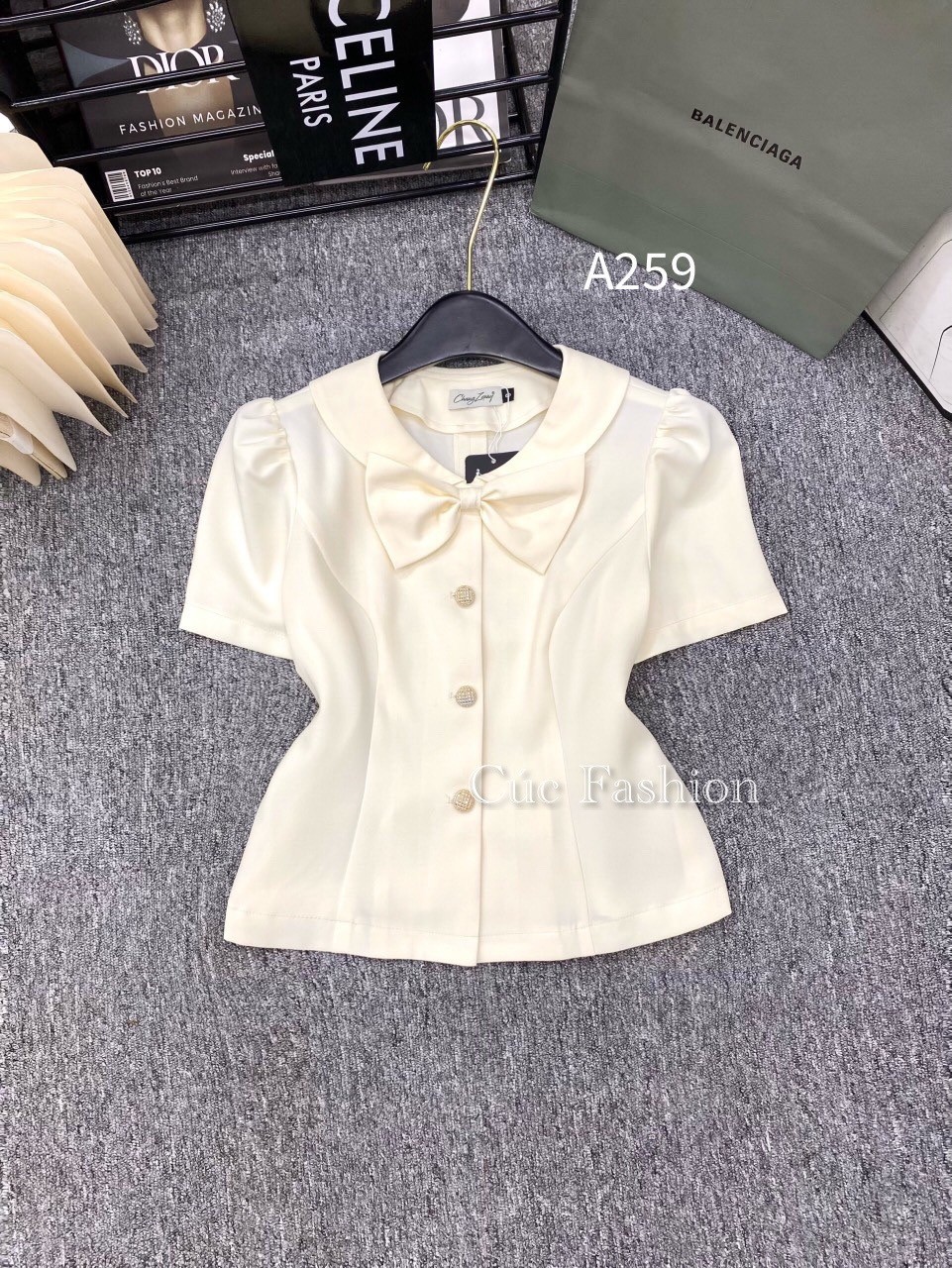 A259 áo peplum cổ nơ 3 cúc