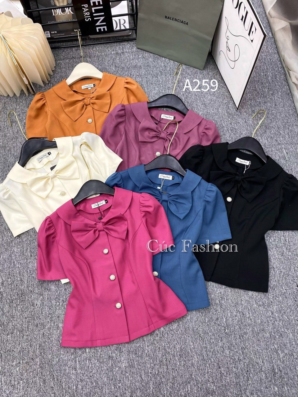 A259 áo peplum cổ nơ 3 cúc