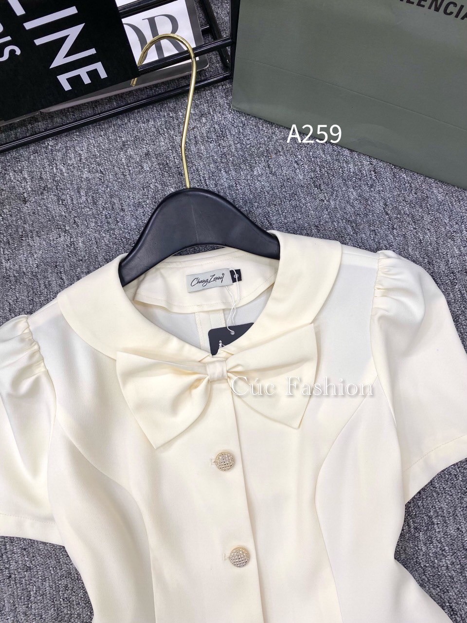 A259 áo peplum cổ nơ 3 cúc