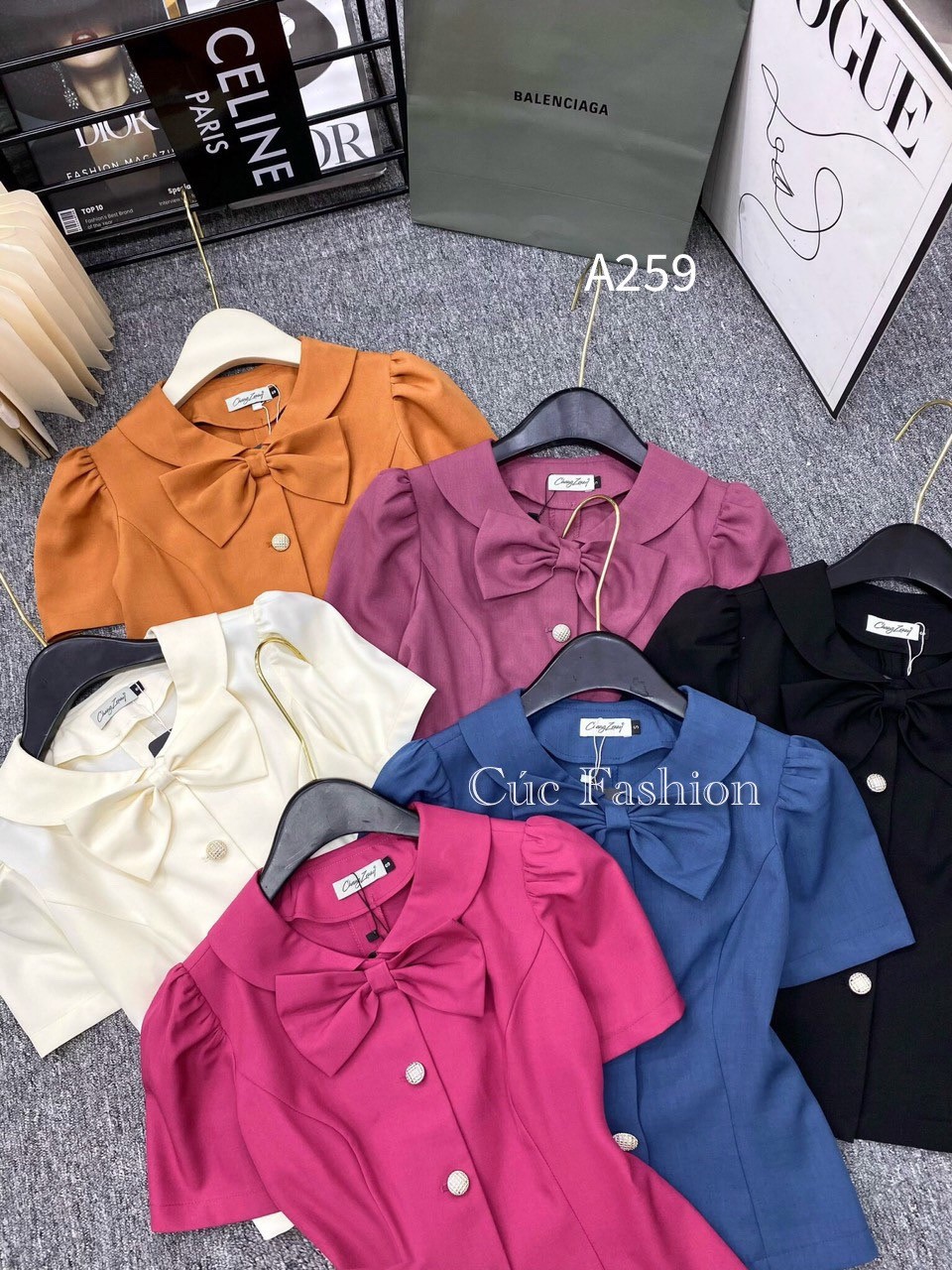 A259 áo peplum cổ nơ 3 cúc