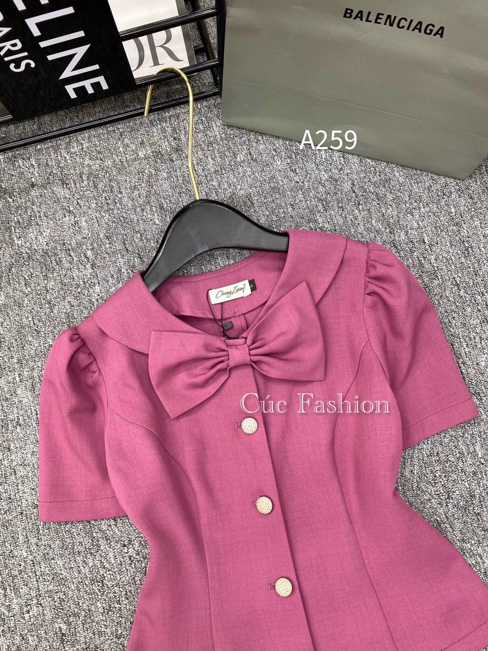 A259 áo peplum cổ nơ 3 cúc