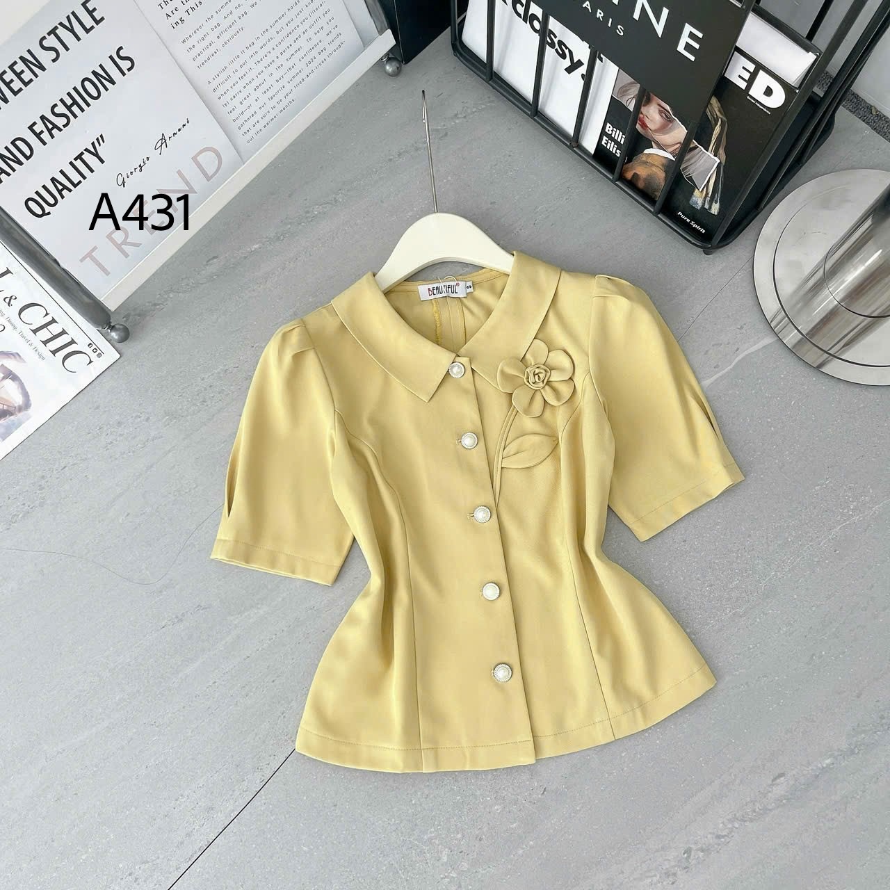 A431 áp peplum gắn hoa