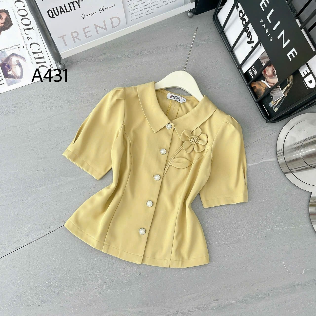 A431 áp peplum gắn hoa