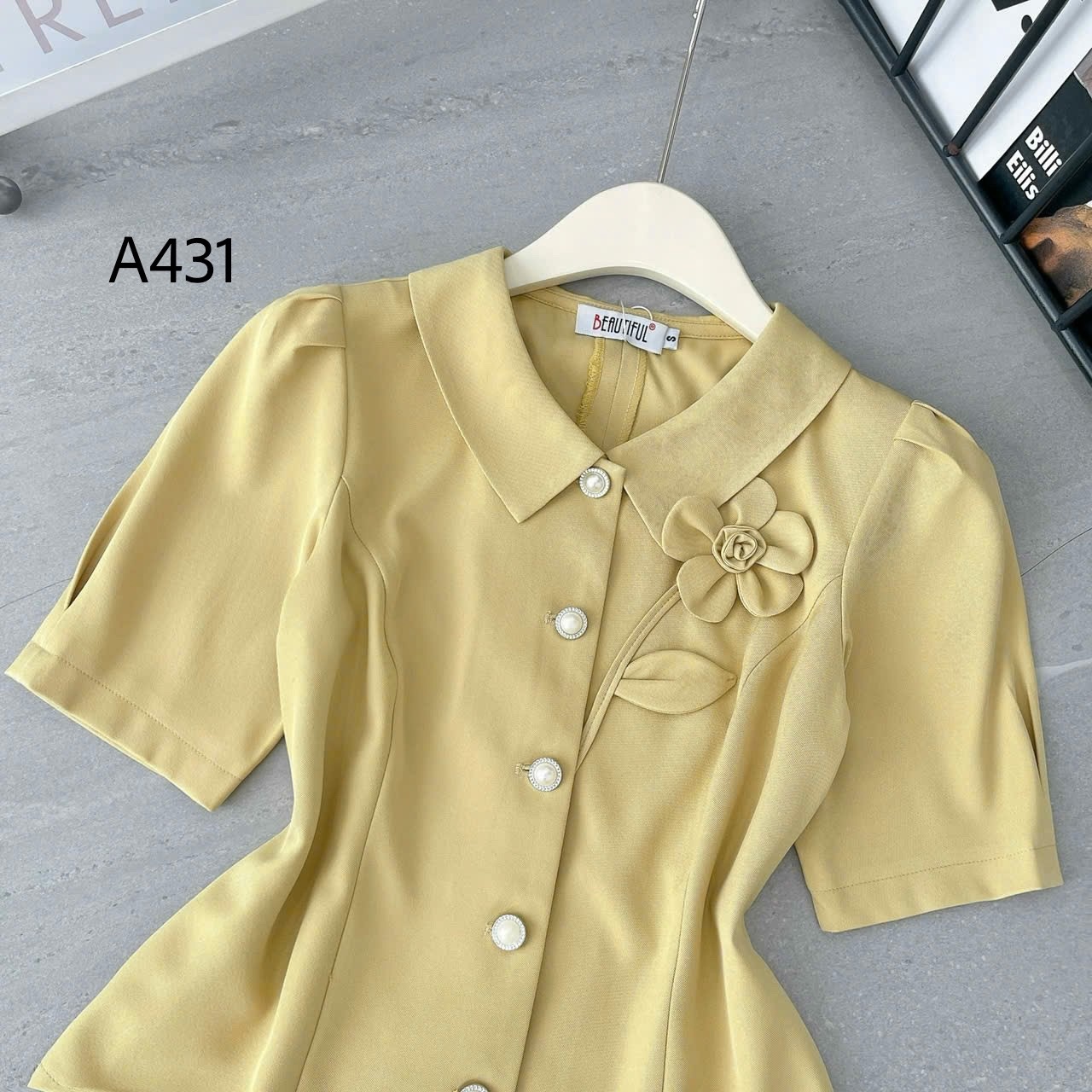 A431 áp peplum gắn hoa