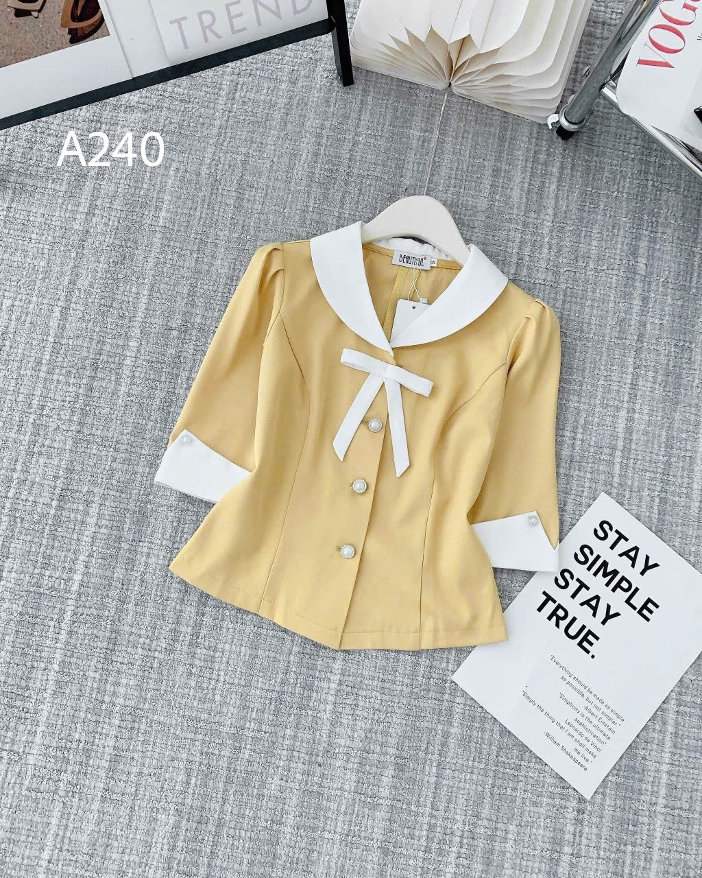 A240 Áo peplum cổ nơ trắng