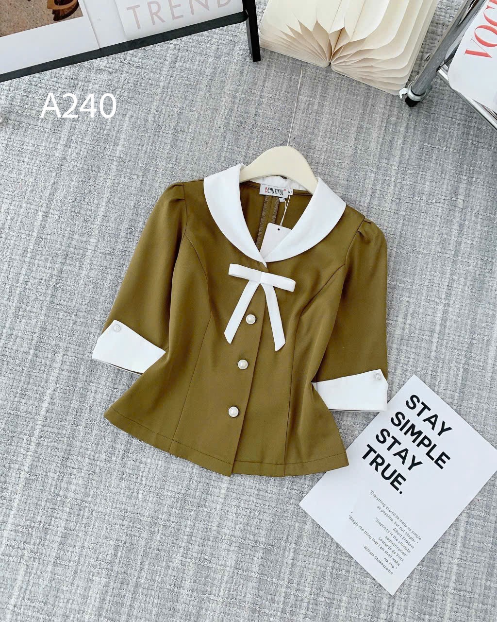 A240 Áo peplum cổ nơ trắng