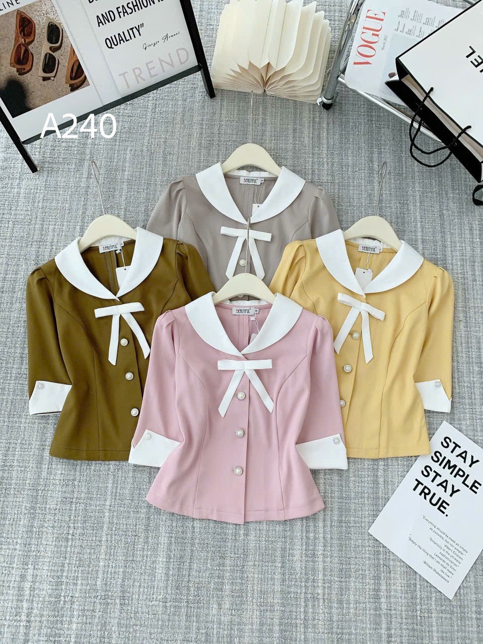 A240 Áo peplum cổ nơ trắng