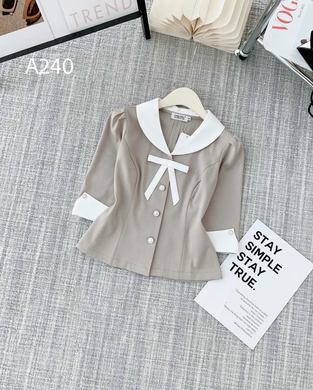 A240 Áo peplum cổ nơ trắng