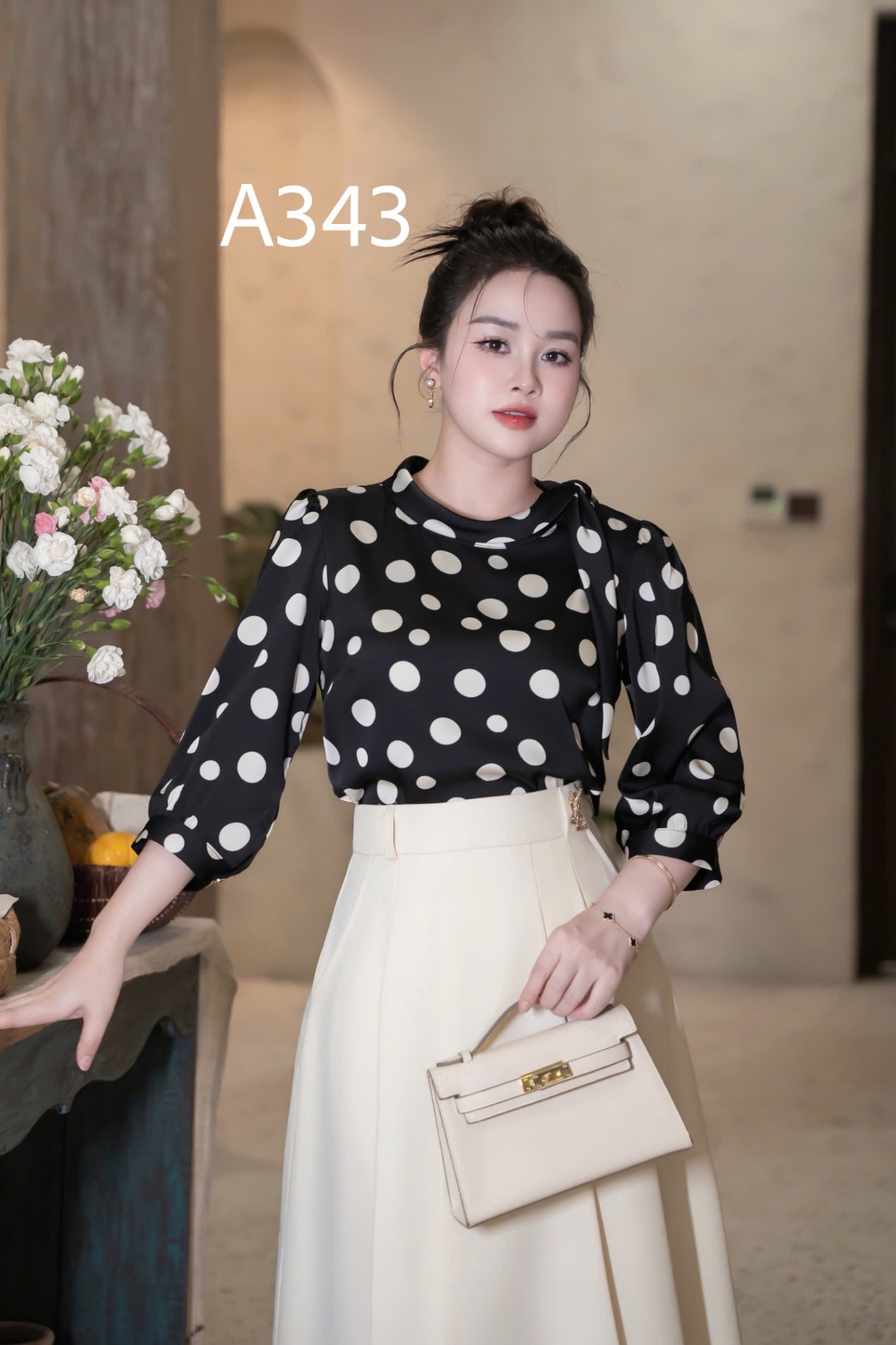 A343 Áo chấm bi tay lỡ nơ lệch