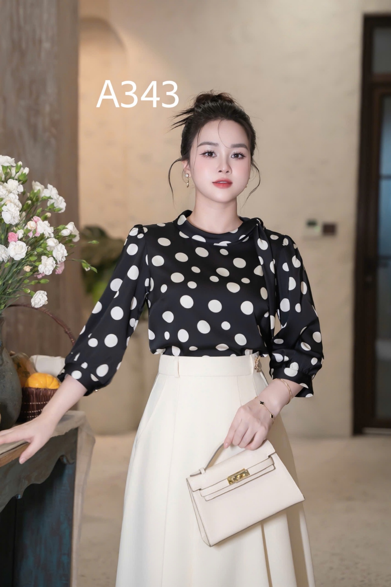 A343 Áo chấm bi tay lỡ nơ lệch
