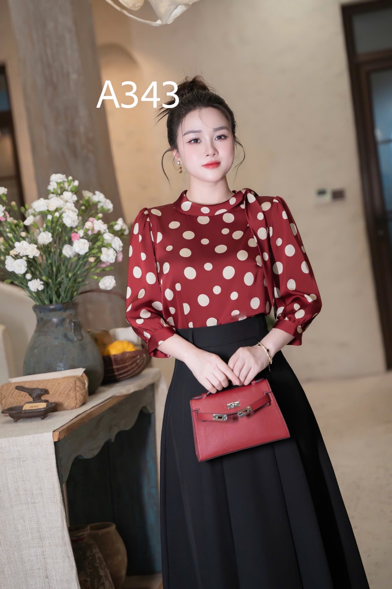 A343 Áo chấm bi tay lỡ nơ lệch