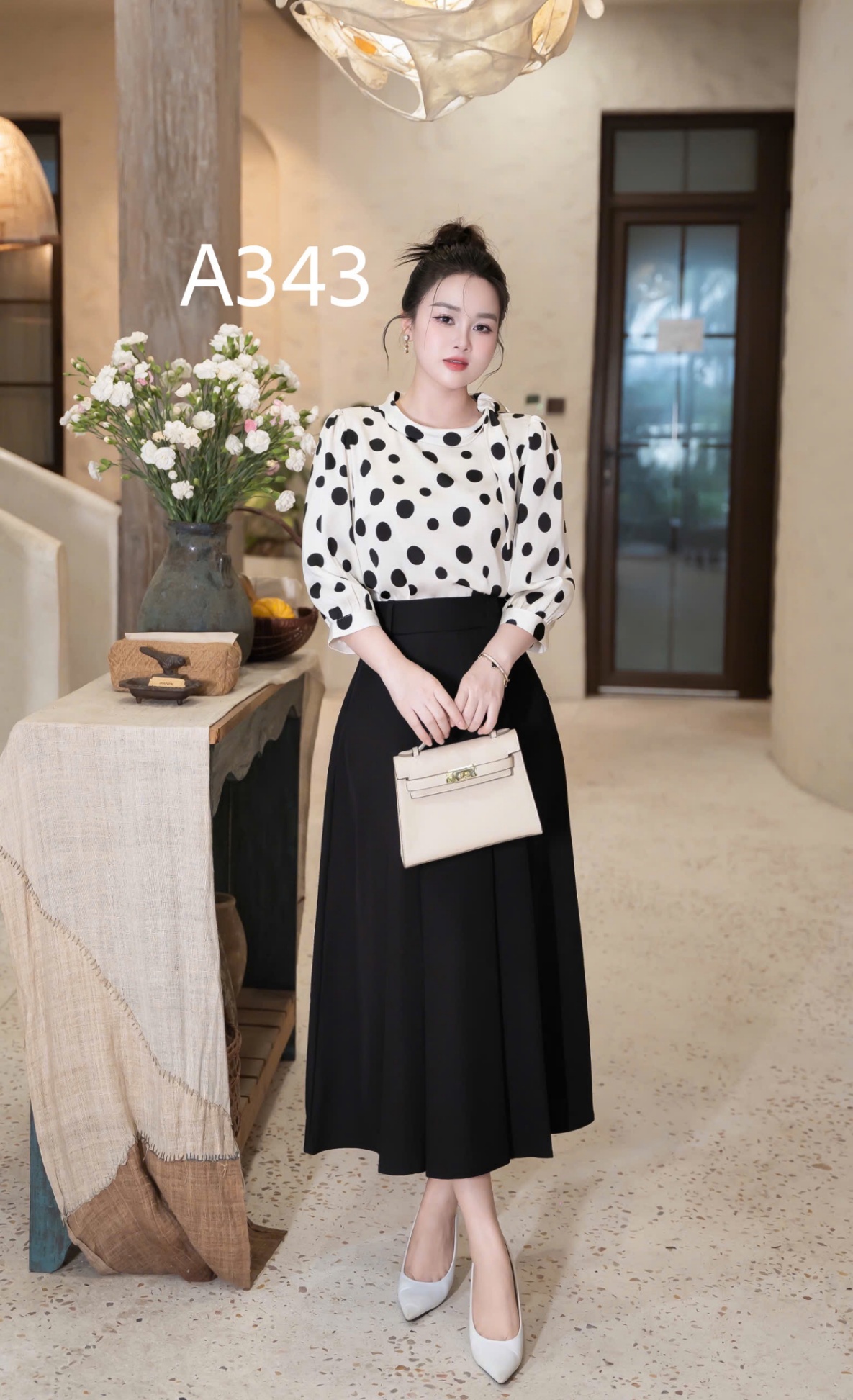 A343 Áo chấm bi tay lỡ nơ lệch