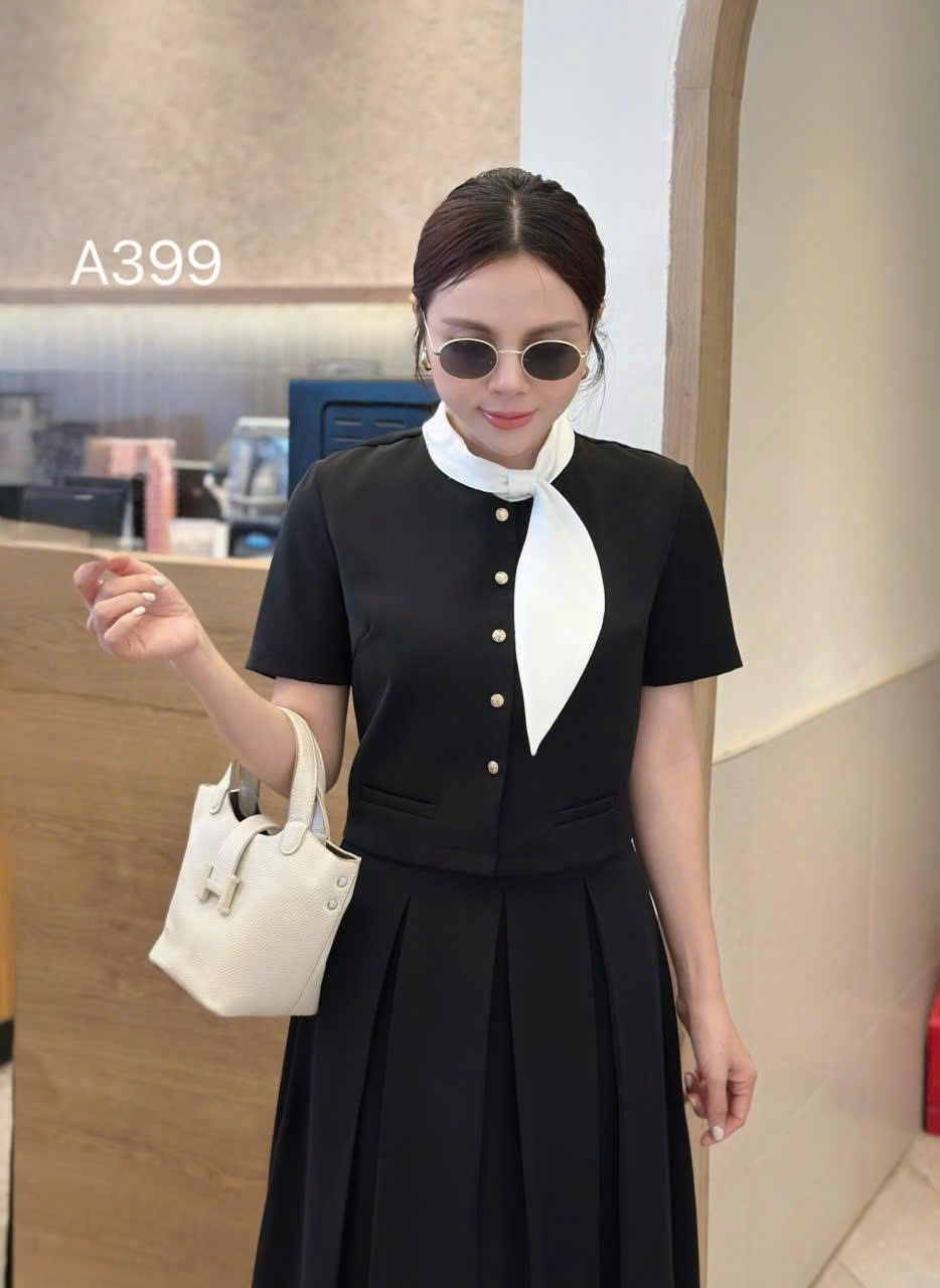 A399 Áo kí giả cổ lá trắng