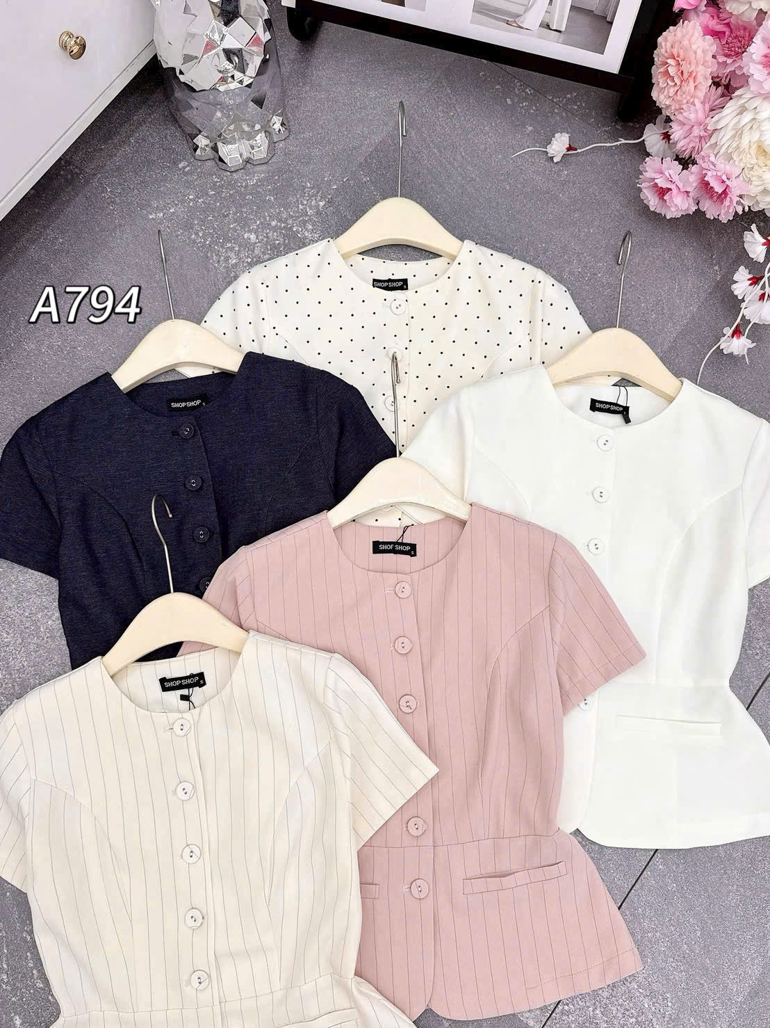 A794 áo peplum cúc bọc