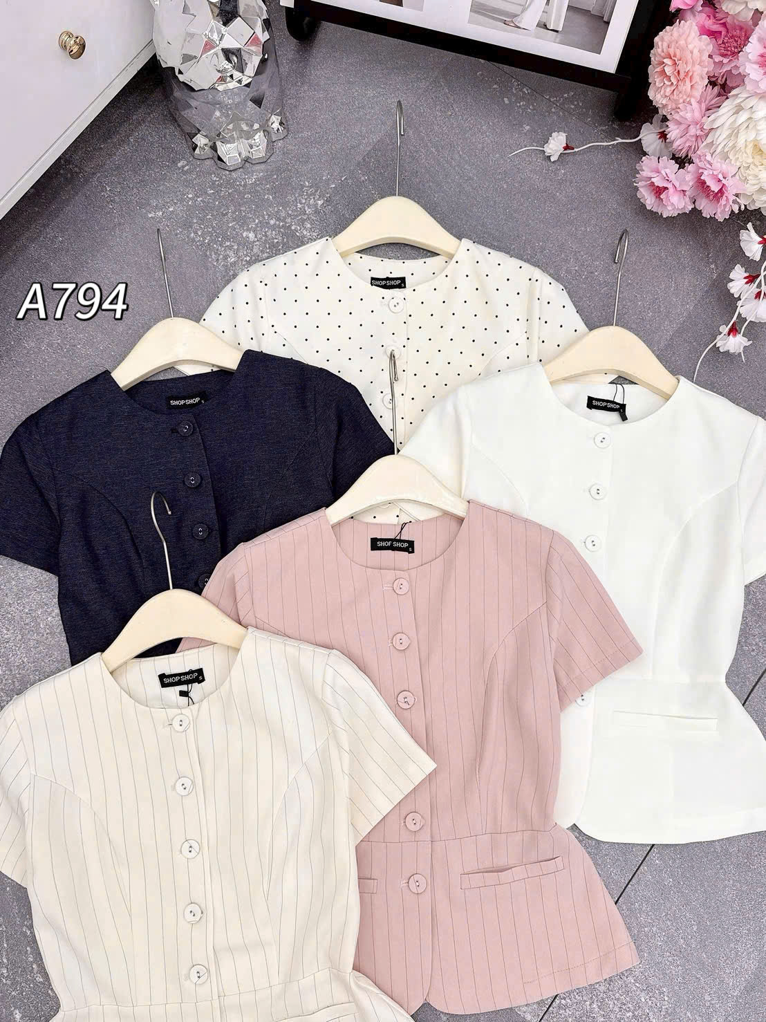 A794 áo peplum cúc bọc