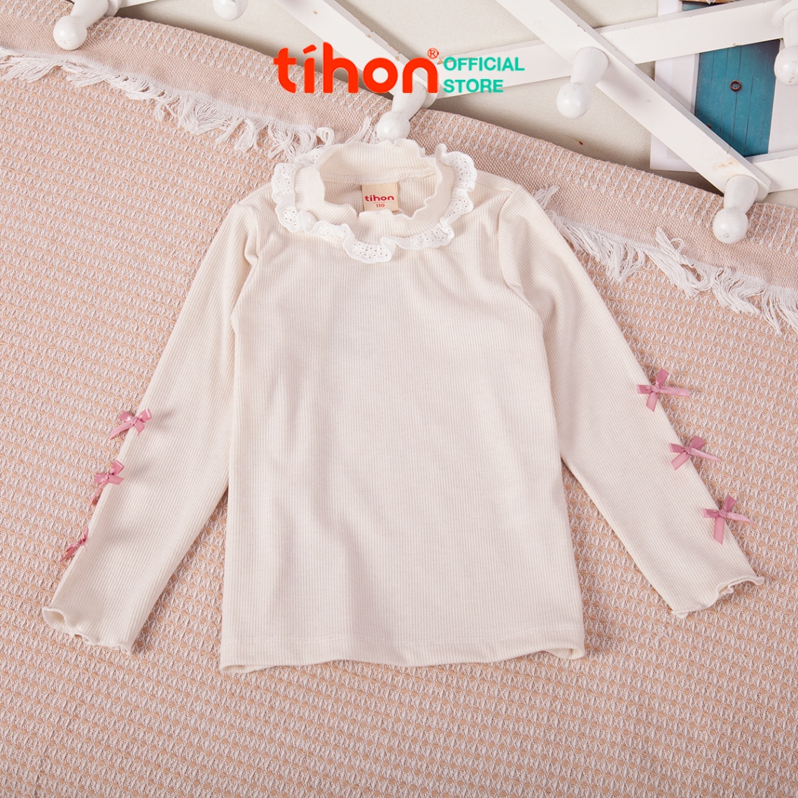 Áo bé gái giữ nhiệt tăm nơ trang trí 106