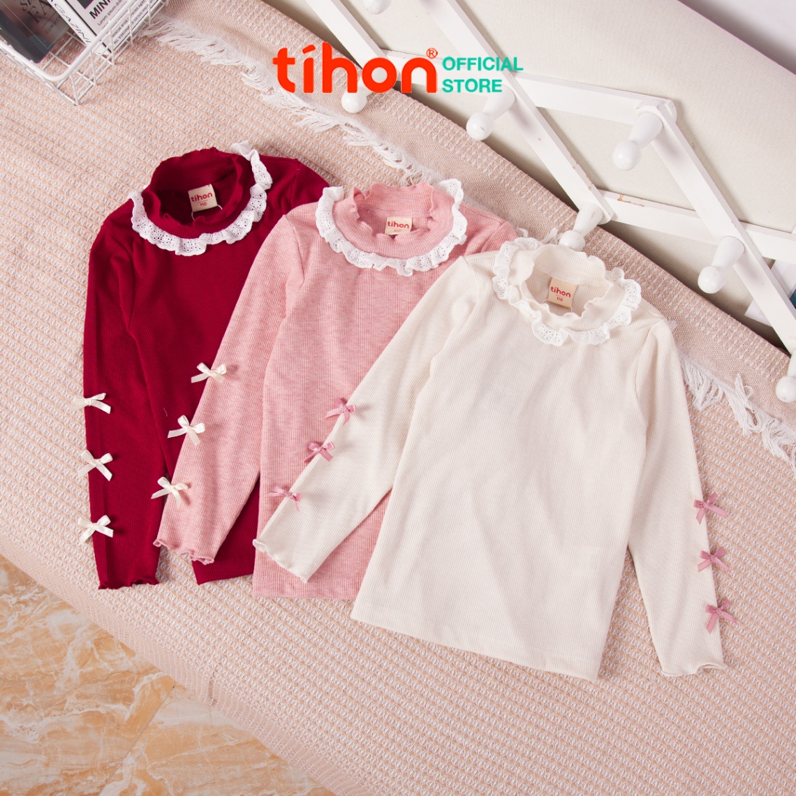 Áo bé gái giữ nhiệt tăm nơ trang trí 106