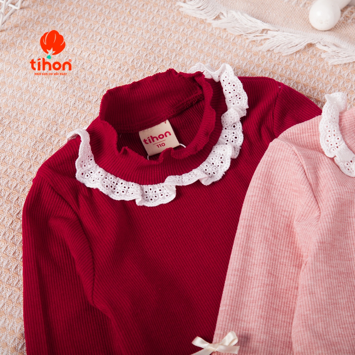 Áo bé gái giữ nhiệt tăm nơ trang trí 106