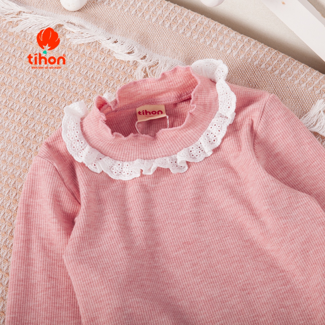 Áo bé gái giữ nhiệt tăm nơ trang trí 106