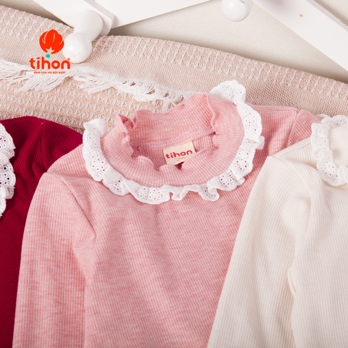 Áo bé gái giữ nhiệt tăm nơ trang trí 106