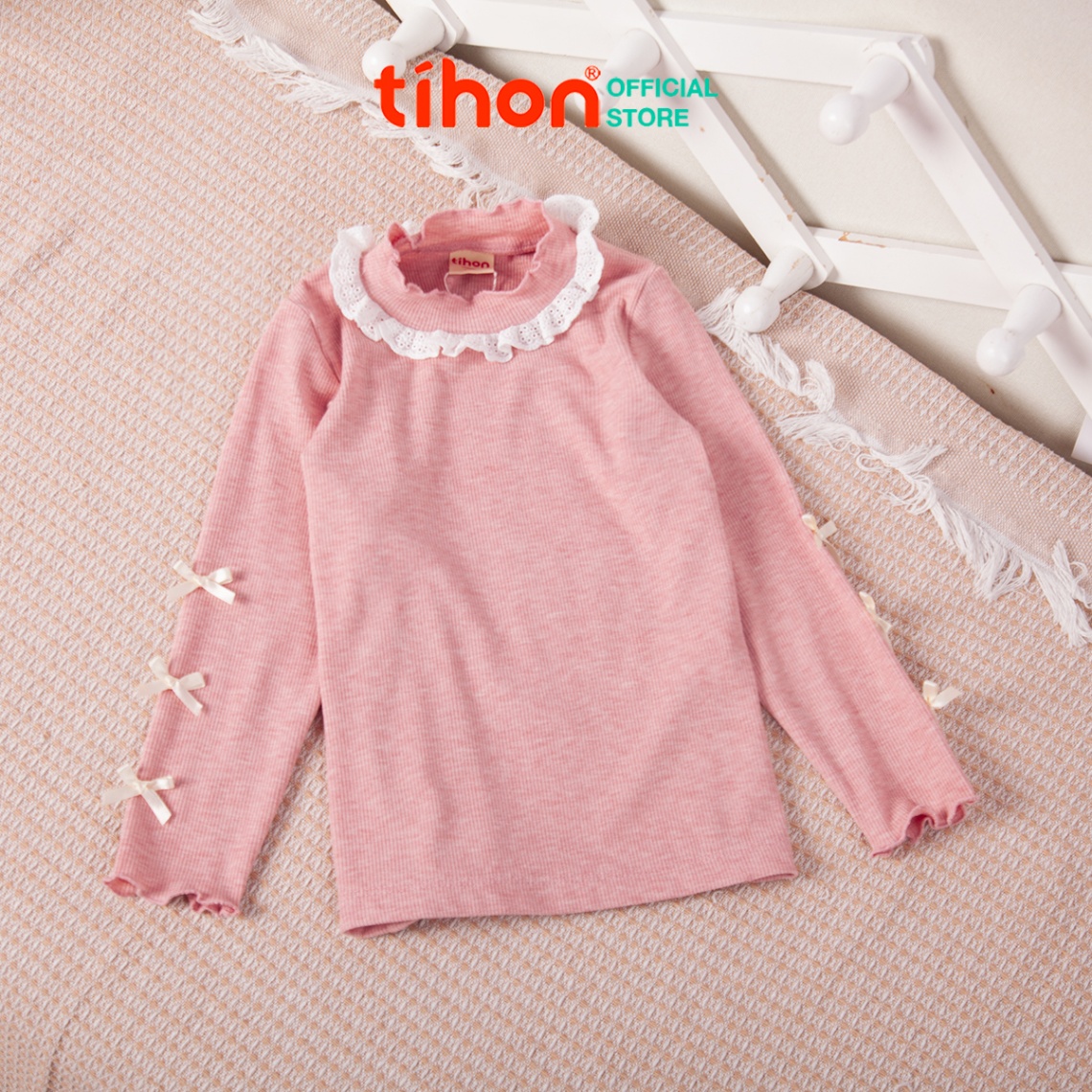 Áo bé gái giữ nhiệt tăm nơ trang trí 106