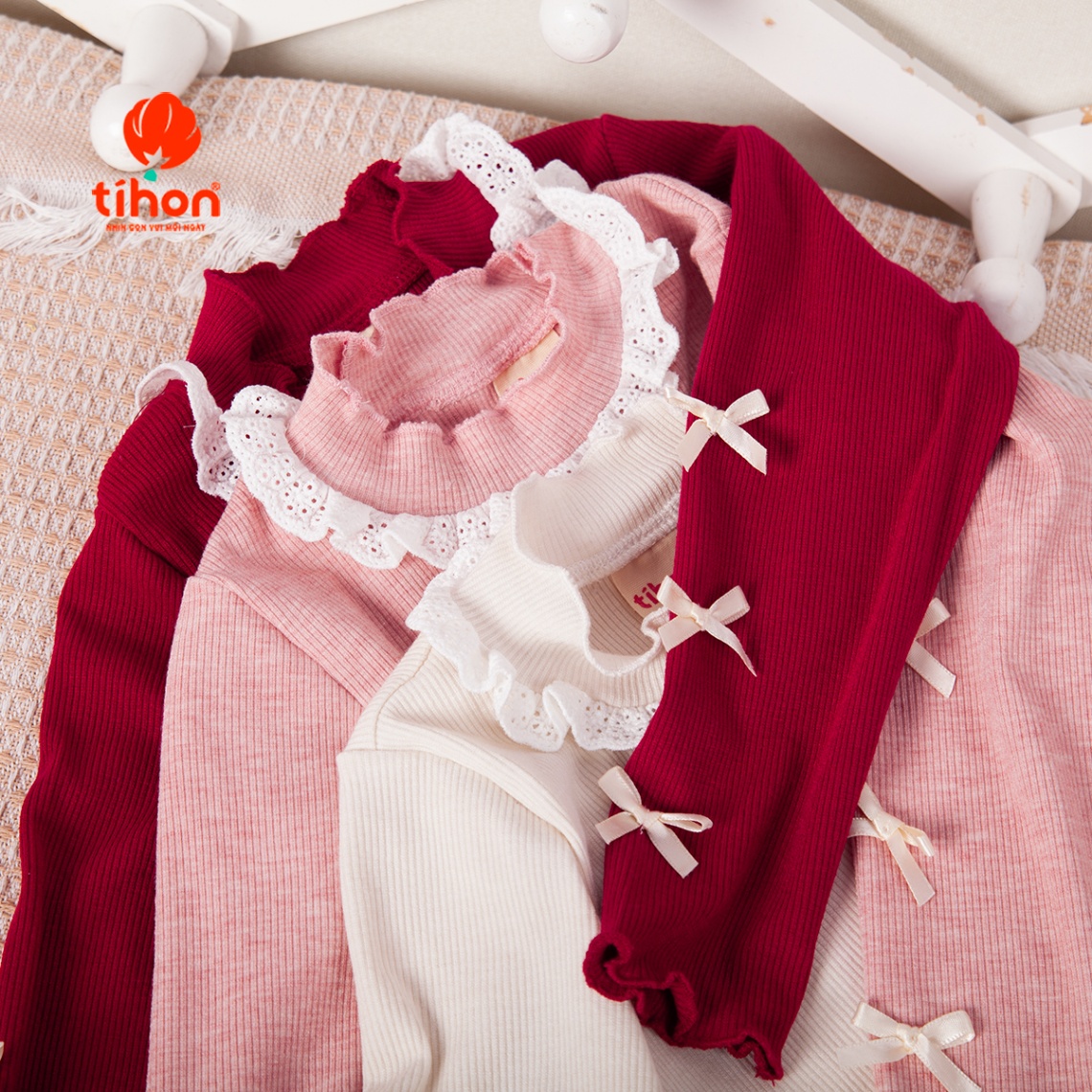 Áo bé gái giữ nhiệt tăm nơ trang trí 106