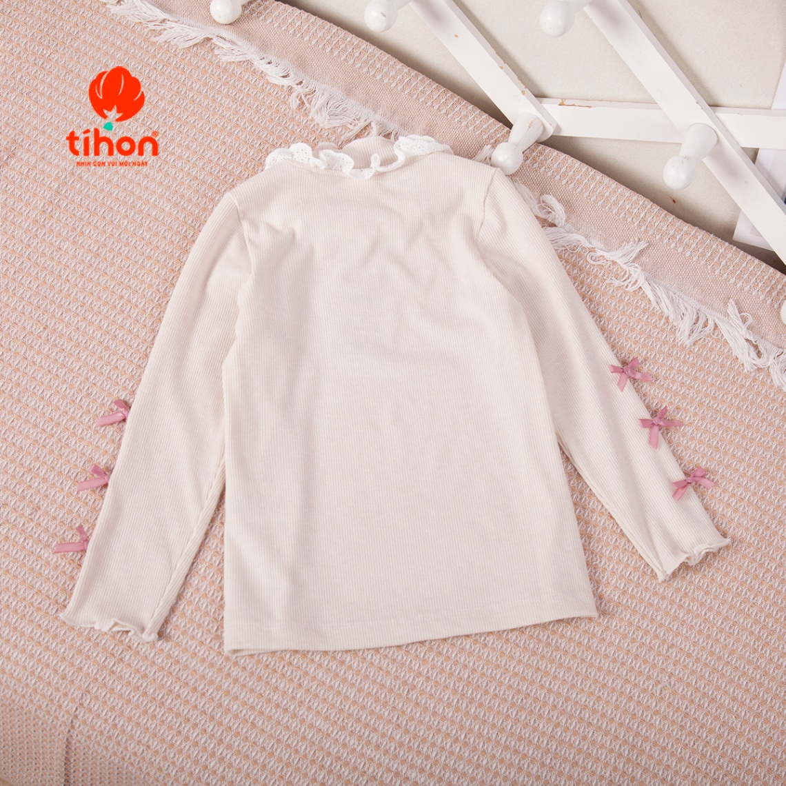Áo bé gái giữ nhiệt tăm nơ trang trí 106