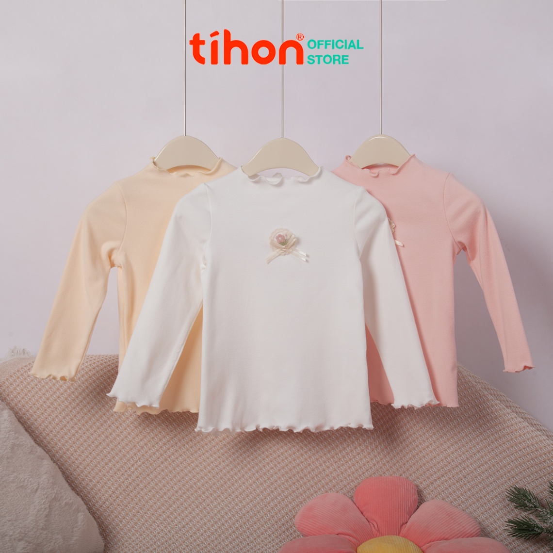Áo bé gái giữ nhiệt đính hoa trang trí 106