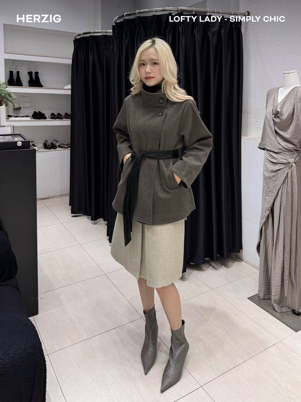 Áo khoác trendcoat đính cổ ngang kèm dây thắt lưng da đen