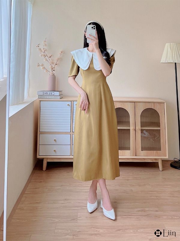 BRIAN VO - Mẫu váy vàng đồng Đơn giản nhưng không kém Sự... | Facebook