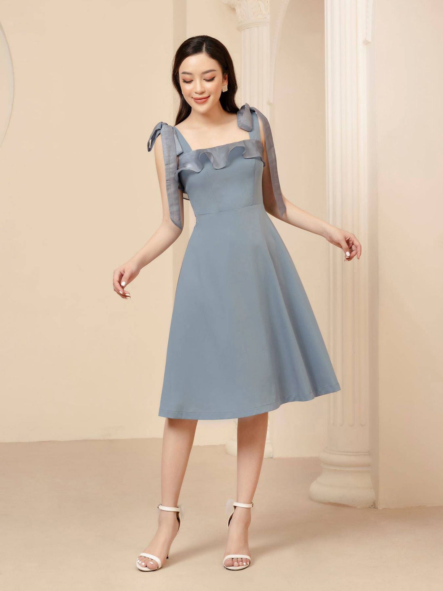 Đầm xanh bèo 2 dây viền nhúng phối nút gỗ - Bán sỉ thời trang mỹ phẩm