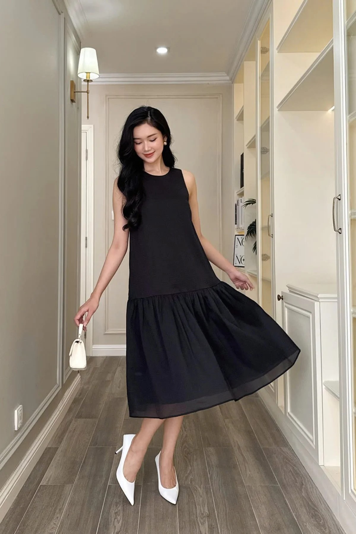 Đầm đen đuôi cá Marc New Tags