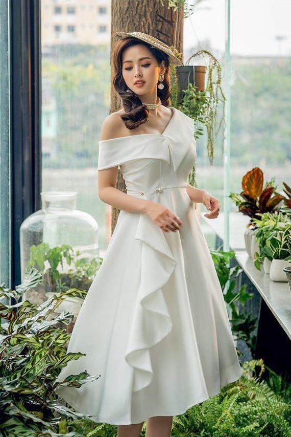 SONGBIRD- Đầm trắng lệch vai