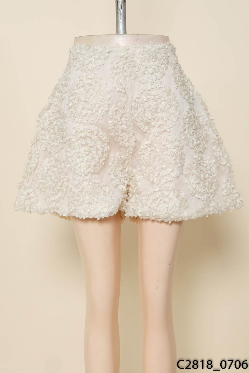 Quần short be hoa nổi