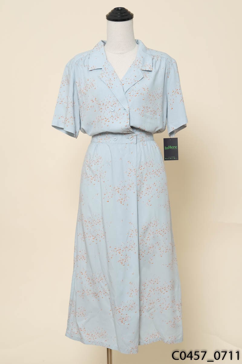 Đầm xanh họa tiết New Tags