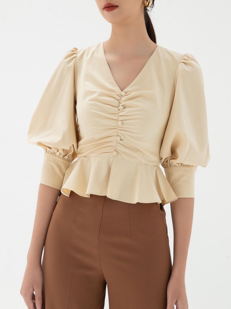 Áo be cổ V D.Chic