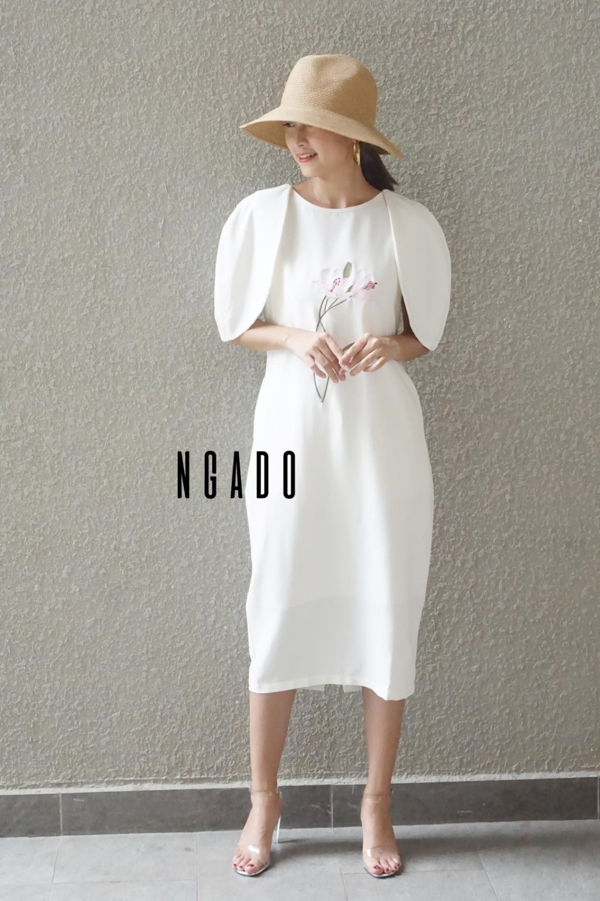 Đầm trắng sát nách Ngado