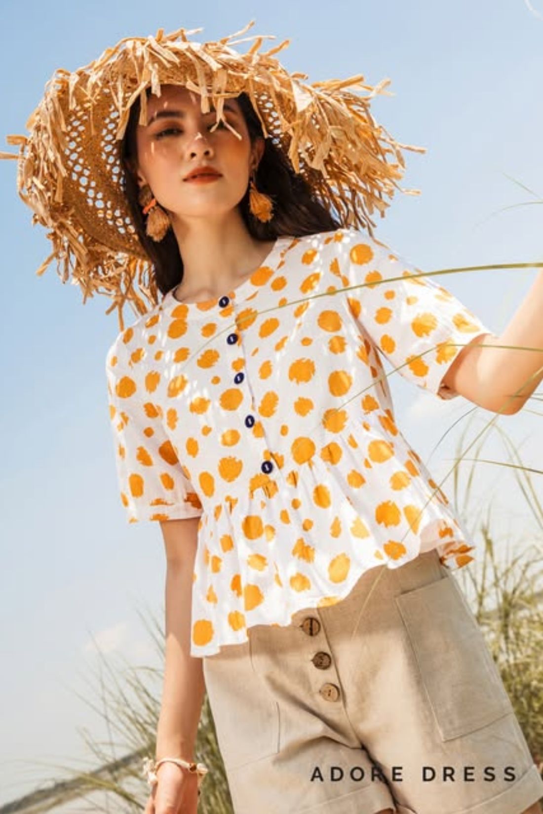 Áo trắng họa tiết chấm cam adore dress