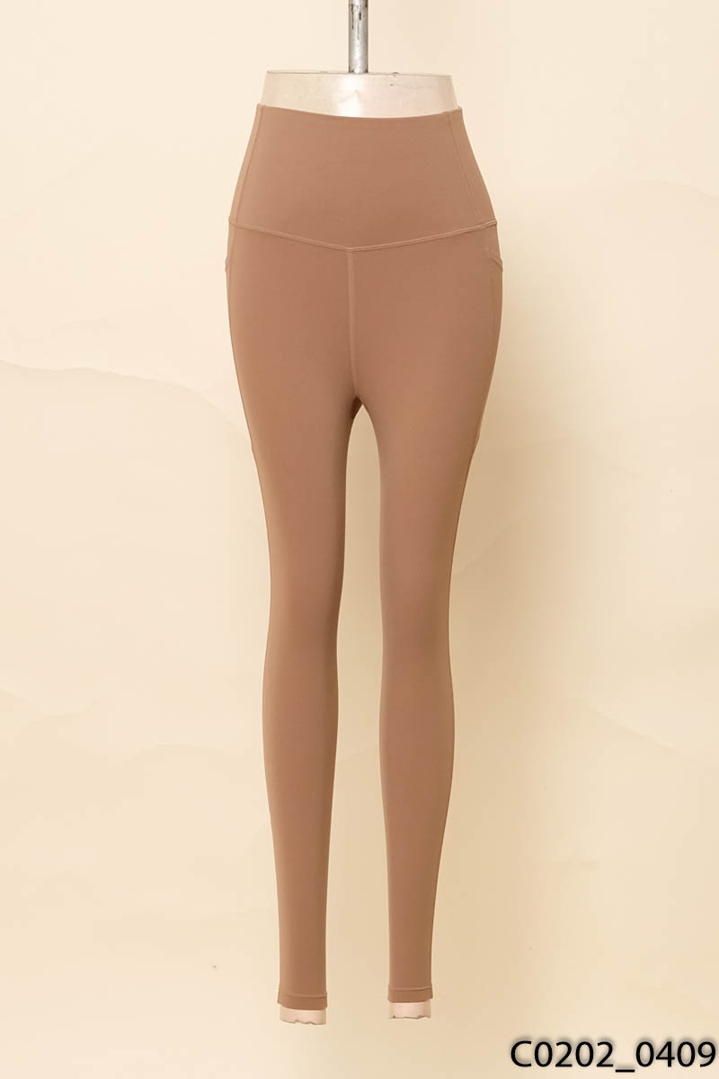MOVING PEACH_Quần legging nâu thể thao có túi New Tags