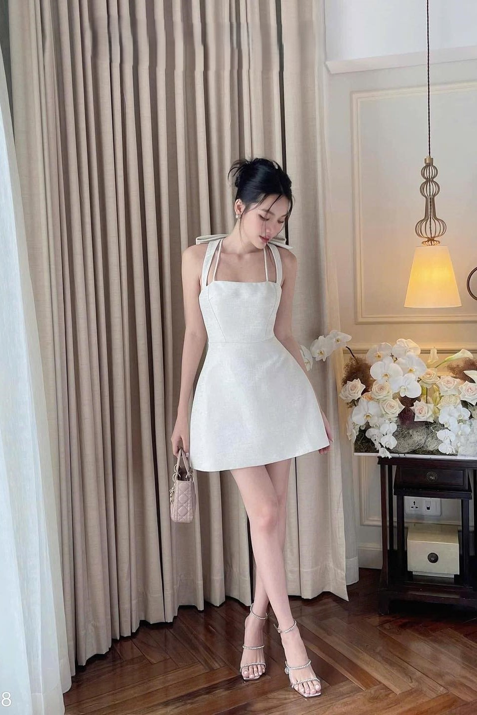 Đầm kem phối nơ cơ