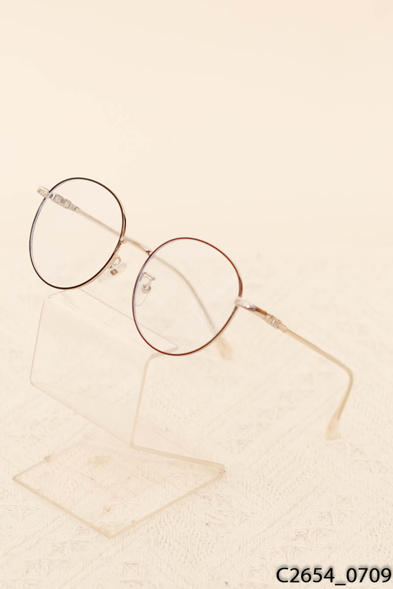 Kính mắt oval gọng kim loại bạc