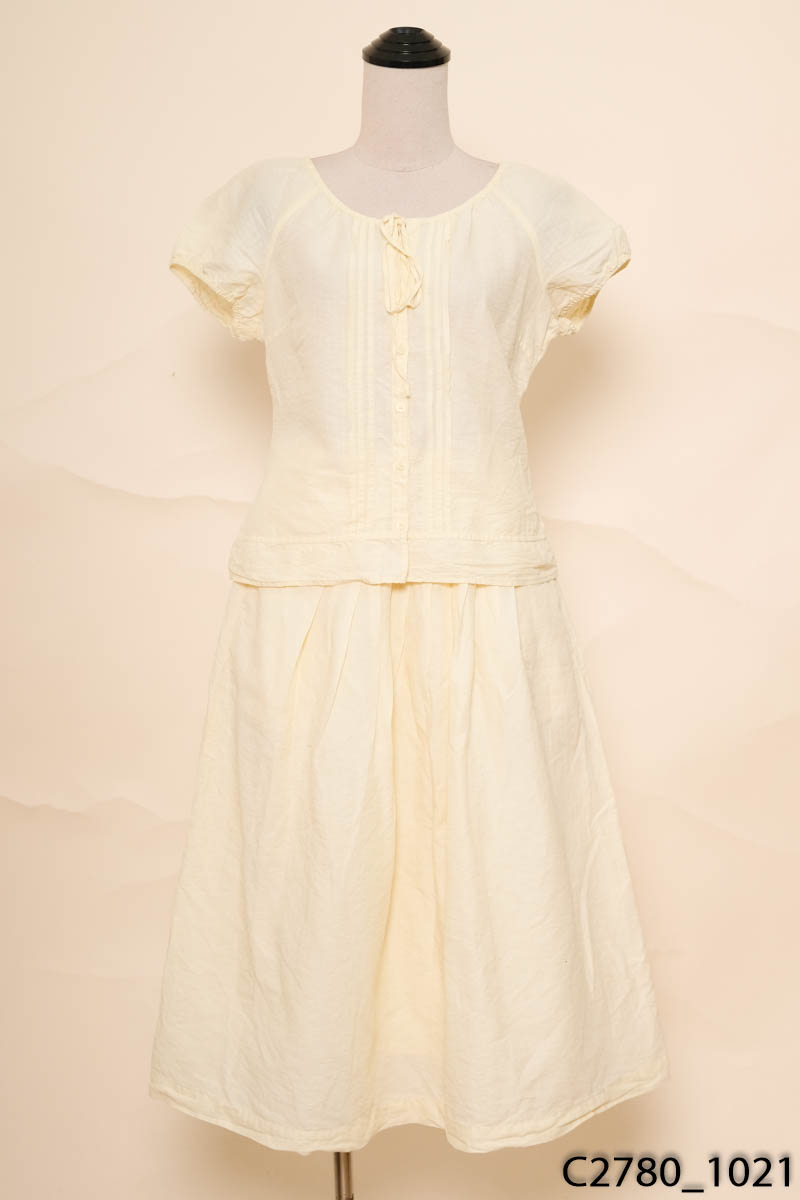 Set áo vàng cộc tay + chân váy Uniqlo